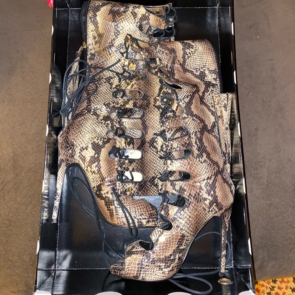 Snake skin thigh high heels